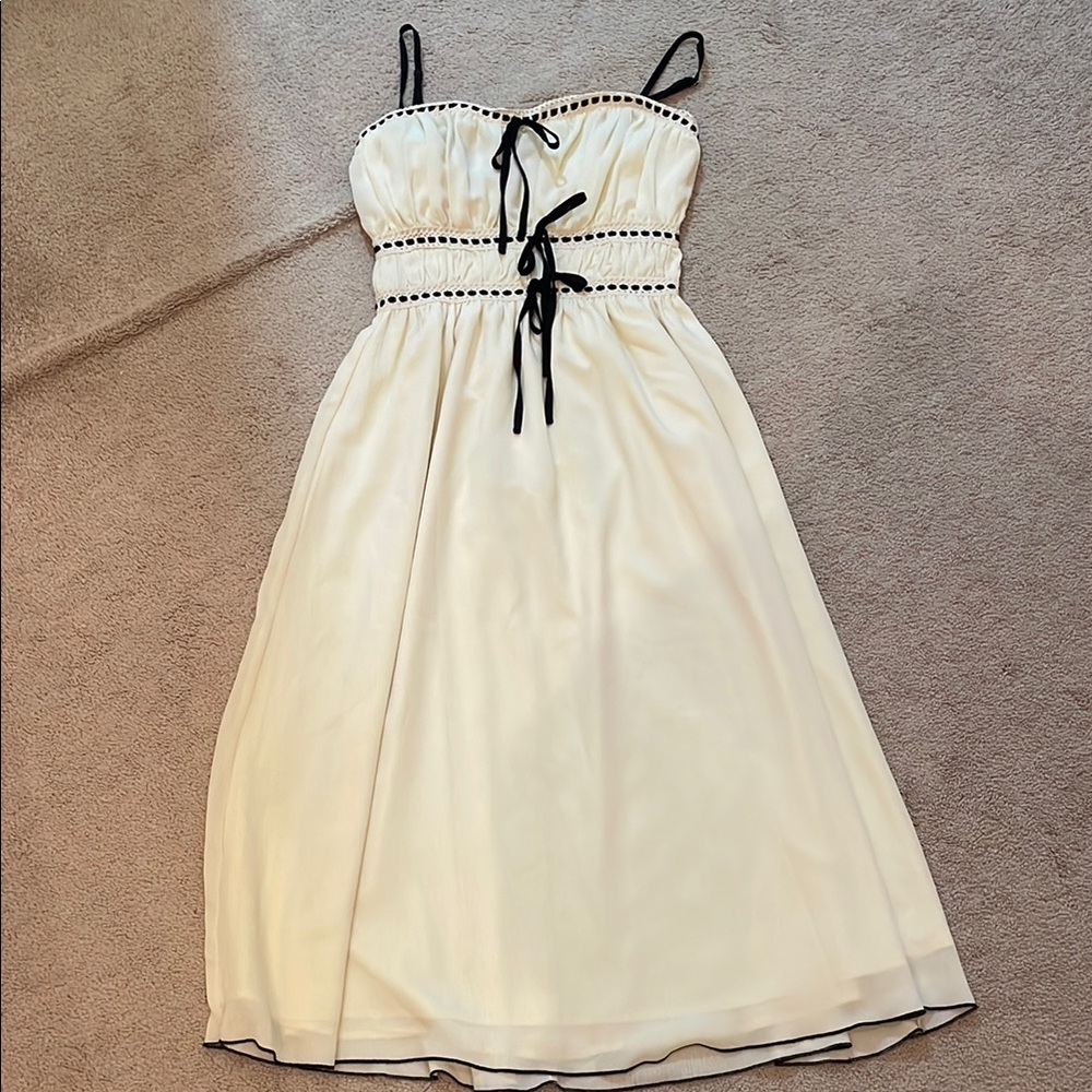 Elegant Cream Dress with Black Accents